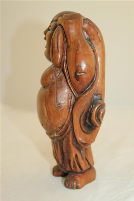 A Chinese boxwood carving of Budai, 22cm